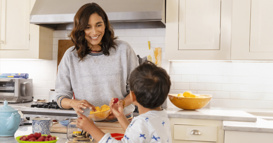 Superior Value hero image of a woman and her son cooking in the kitchen